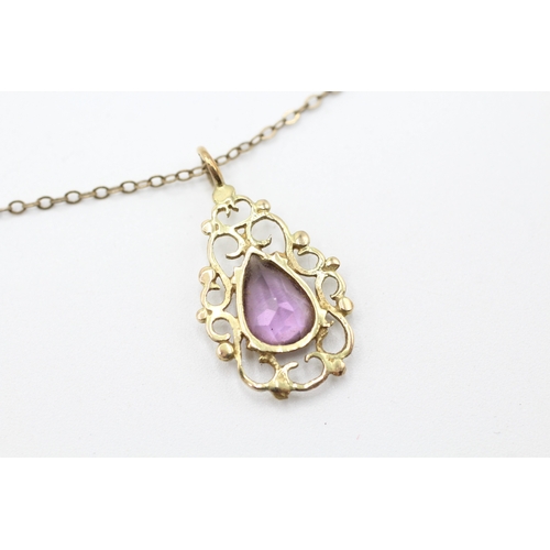 67 - 9ct gold and amethyst pendant on chain (2.4g)