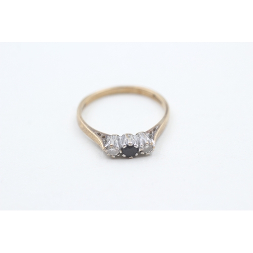 72 - 9ct gold diamond and sapphire three stone ring (1.7g) Size N 1/2