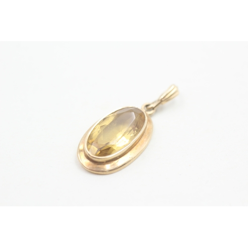 78 - 9ct gold citrine pendant (4g)