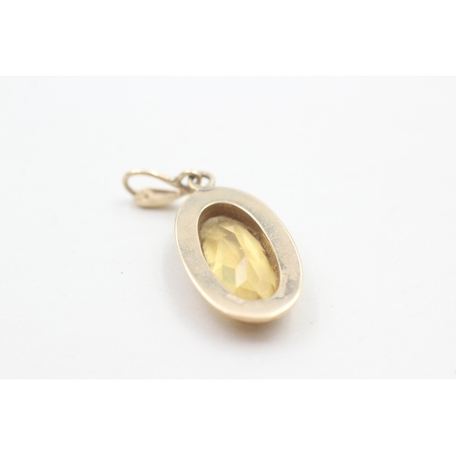 78 - 9ct gold citrine pendant (4g)