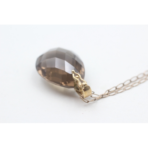 87 - 9ct gold faceted smokey quartz pendant necklace (7.6g)