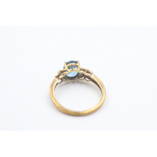 99 - 9ct gold blue topaz & diamond dress ring (2g) Size M 1/2