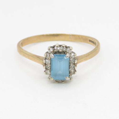 123 - 9ct gold blue topaz & diamond dress ring (1.9g) Size  P