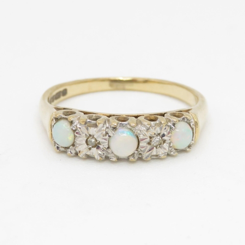 129 - 9ct gold opal and diamond ring (2.3g) Size  N