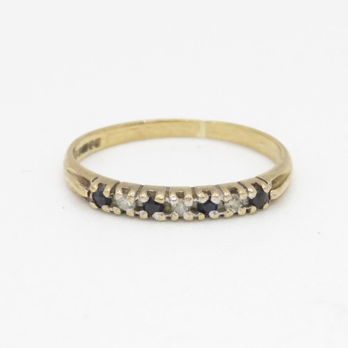 131 - 9ct gold diamond and sapphire ring (1g) Size  J