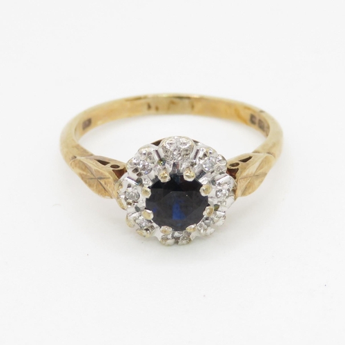 138 - 9ct gold sapphire and diamond halo set ring (2.8g) Size  M