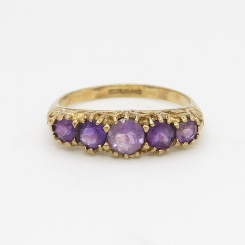 54 - 9ct gold amethyst set five stone dress ring (1.9g) Size  L 1/2