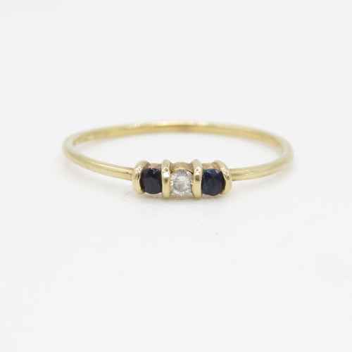 62 - 9ct gold dainty sapphire and diamond set trilogy ring (0.5g) Size  J 1/2