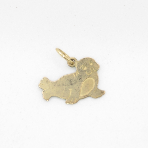 65 - 9ct gold seal charm (0.6g)