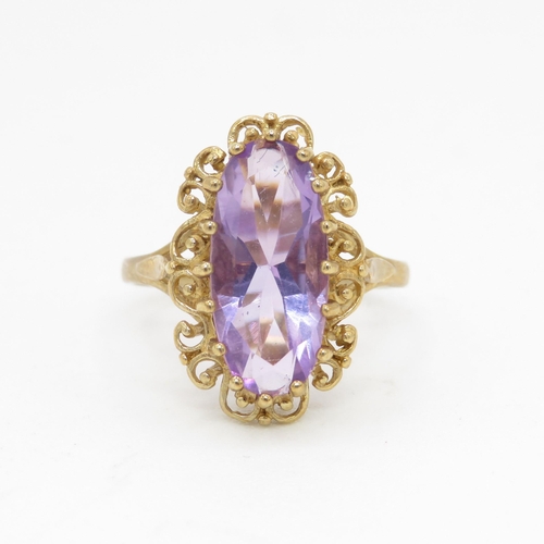 72 - 9ct gold amethyst set cocktail ring (3.2g) Size  M