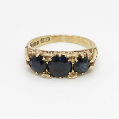 73 - 9ct gold sapphire set trilogy ring (3.7g) Size  I 1/2