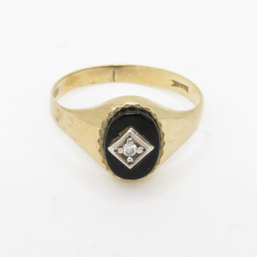 94 - 9ct gold black onyx & paste ring (1.4g) Size  L