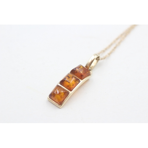 106 - 14ct gold amber drop pendant necklace (2.3g)