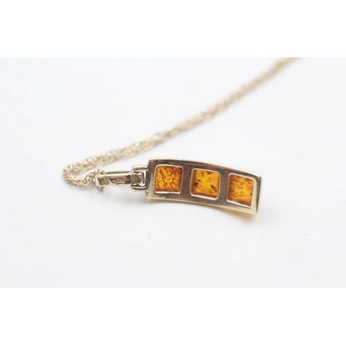 106 - 14ct gold amber drop pendant necklace (2.3g)