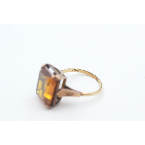 107 - 9ct gold vintage yellow gemstone dress ring (5.8g) Size  O