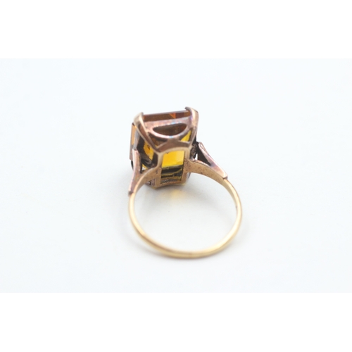 107 - 9ct gold vintage yellow gemstone dress ring (5.8g) Size  O