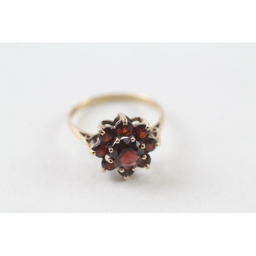 113 - 9ct gold garnet set cluster ring (2.2g) Size  N 1/2