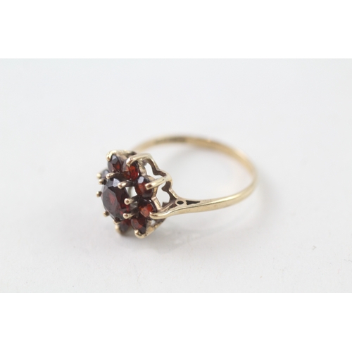 113 - 9ct gold garnet set cluster ring (2.2g) Size  N 1/2