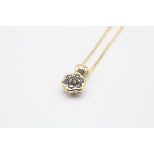 114 - 9ct gold and sapphire pendant on chain (2.3g)