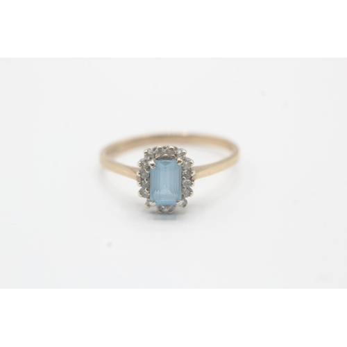 123 - 9ct gold blue topaz & diamond dress ring (1.9g) Size  P