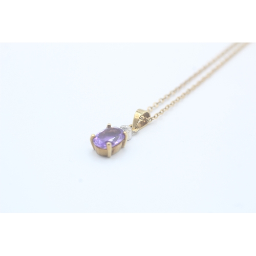 126 - 9ct gold oval cut amethyst & diamond pendant necklace (2.3g)