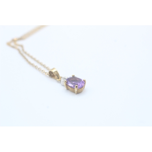 126 - 9ct gold oval cut amethyst & diamond pendant necklace (2.3g)