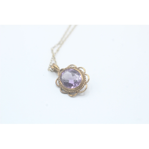 127 - 9ct gold oval cut amethyst pendant necklace (2.3g)