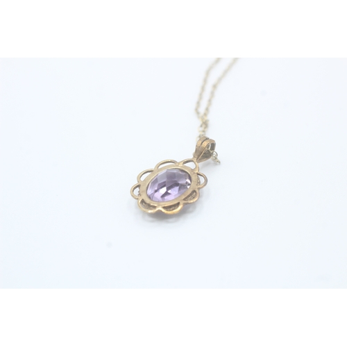 127 - 9ct gold oval cut amethyst pendant necklace (2.3g)