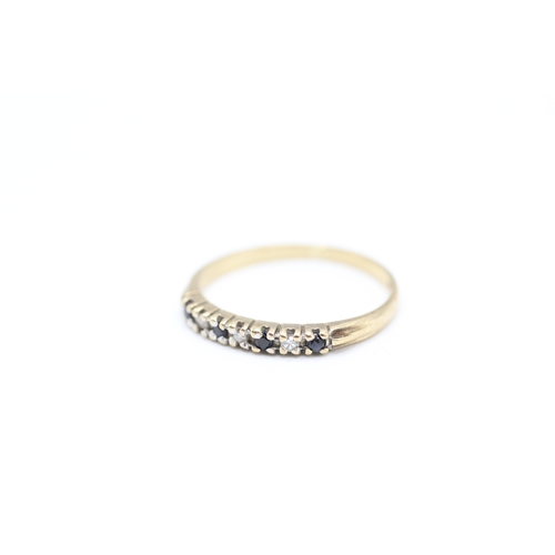 131 - 9ct gold diamond and sapphire ring (1g) Size  J