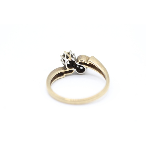 132 - 9ct gold and diamond ring (2.3g) Size  K 1/2