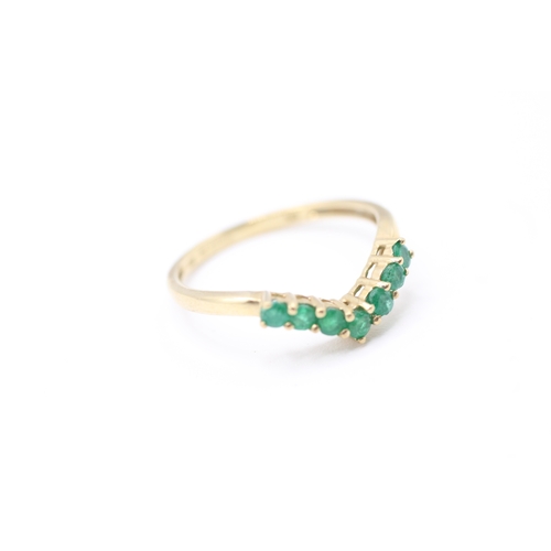 133 - 9ct gold and emerald chevron ring (1.3g) Size  N