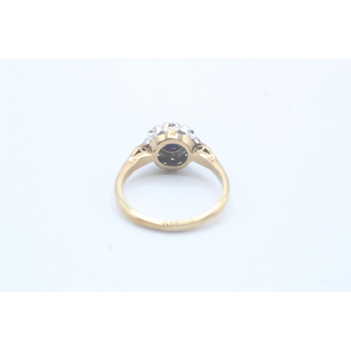 138 - 9ct gold sapphire and diamond halo set ring (2.8g) Size  M