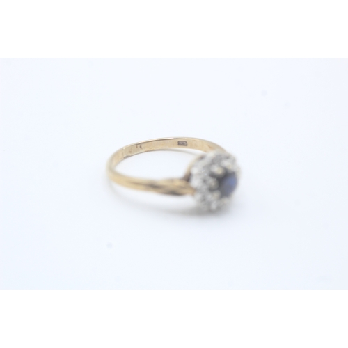 138 - 9ct gold sapphire and diamond halo set ring (2.8g) Size  M