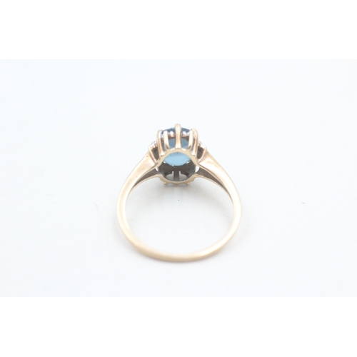 21 - 9ct blue topaz & diamond cluster ring (2.1g) Size  O