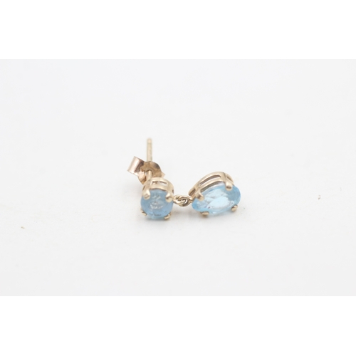 23 - 9ct gold blue topaz drop earrings (1g)