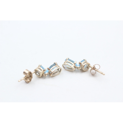 23 - 9ct gold blue topaz drop earrings (1g)