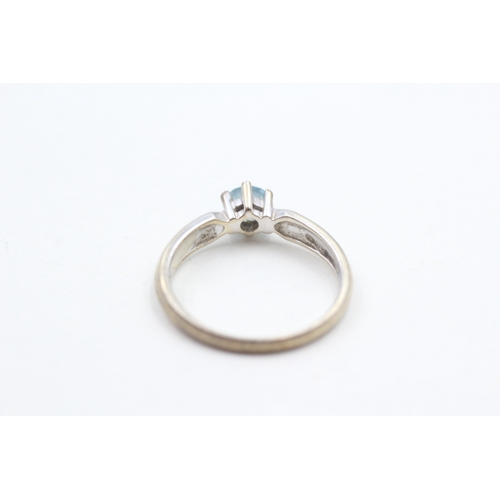 27 - 9ct gold blue topaz solitaire ring (3.1g) Size  Q