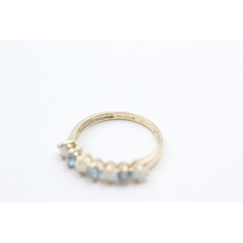 3 - 9ct gold opal & blue topaz half eternity ring (1.7g) Size  O 1/2