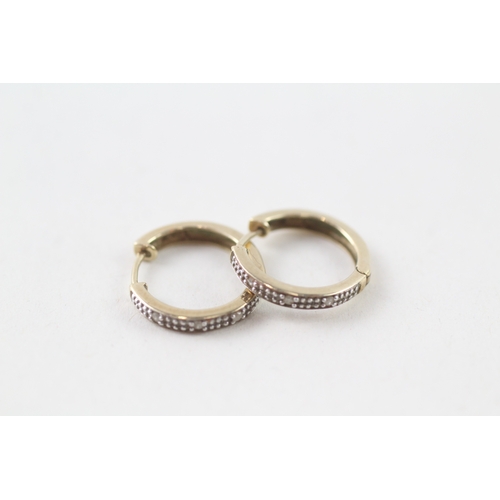 43 - 9ct gold diamond set huggy hoop earrings (1.4g)