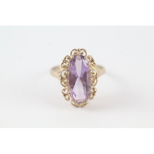 72 - 9ct gold amethyst set cocktail ring (3.2g) Size  M