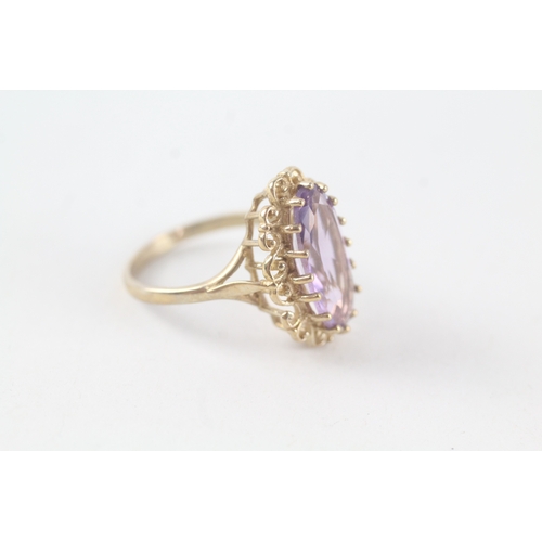 72 - 9ct gold amethyst set cocktail ring (3.2g) Size  M