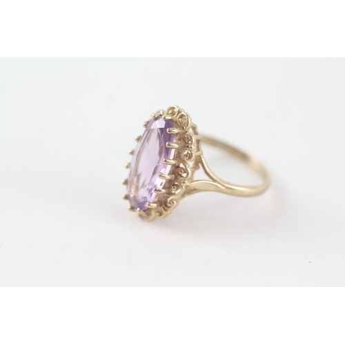 72 - 9ct gold amethyst set cocktail ring (3.2g) Size  M