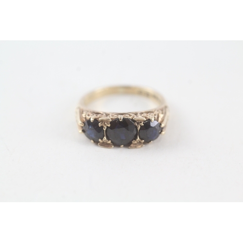 73 - 9ct gold sapphire set trilogy ring (3.7g) Size  I 1/2