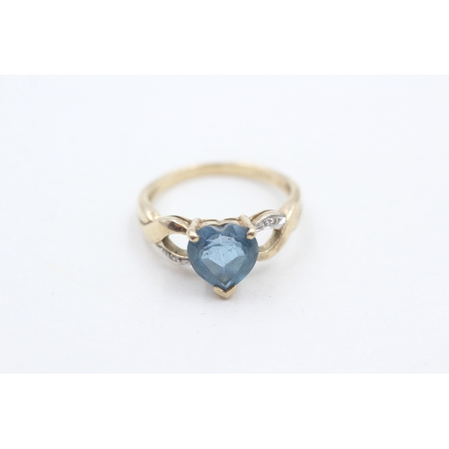 90 - 9ct gold heart shape blue topaz & diamond dress ring (2.7g) Size  N 1/2