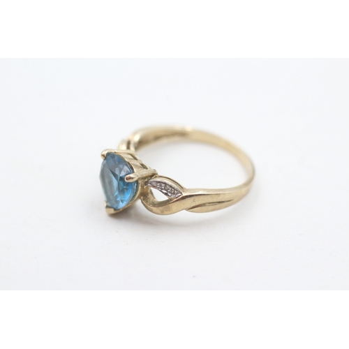 90 - 9ct gold heart shape blue topaz & diamond dress ring (2.7g) Size  N 1/2