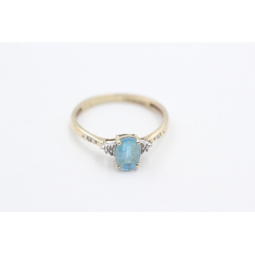 98 - 9ct gold oval cut blue topaz & diamond dress ring (1.2g) Size  N