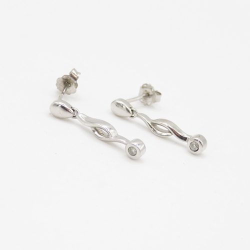 128 - 9ct white gold diamond set drop earrings (1.6g)