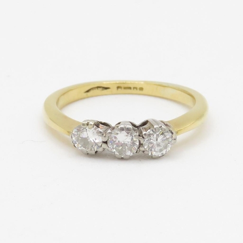 147 - 18ct gold round brilliant cut diamond three stone ring (3.2g) Size M