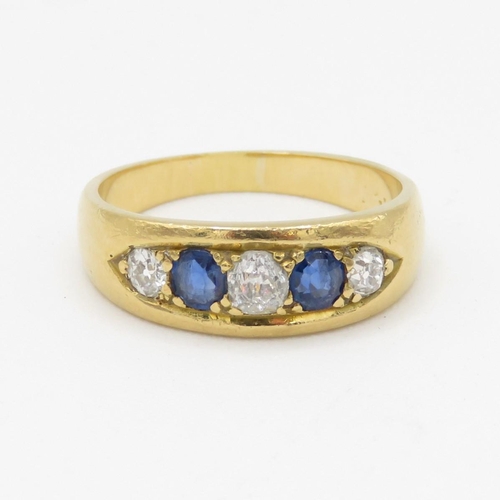 148 - 18ct gold diamond & sapphire five stone ring (5.1g) Size O