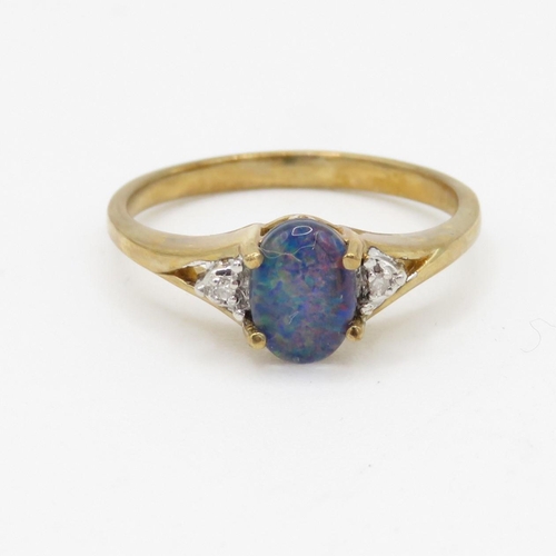 172 - 9ct gold opal triplet and diamond ring (2.1g) Size M